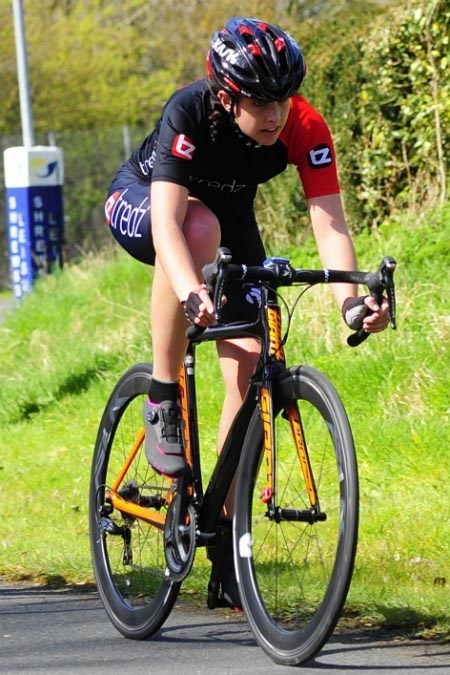 Danni in Team Tredz kit on her Giant road bike in action
